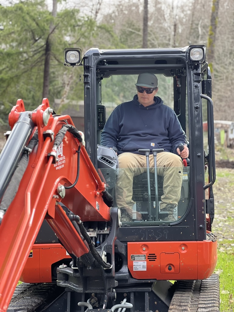 Construction crew at work on a Mason County excavation project